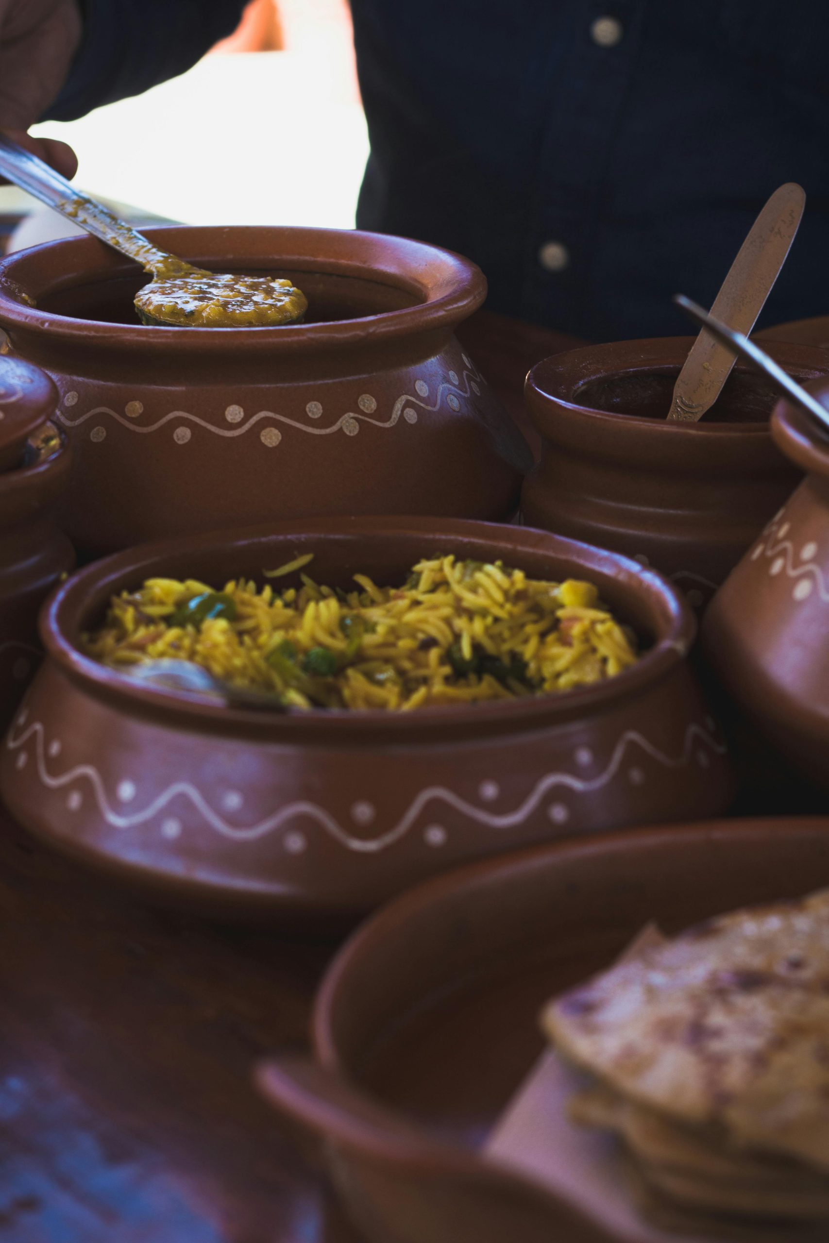 Indian traditional cuisine served in clay pots clay pots